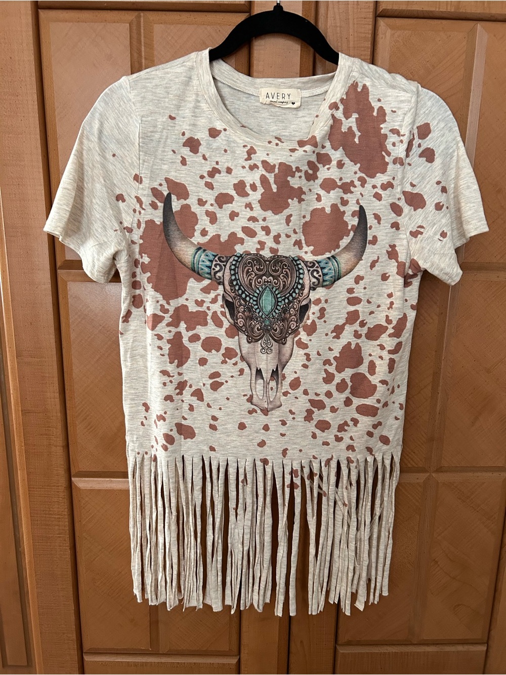 Avery Cream Tee with Rust Splatter and Turquoise Accent Bull Skull